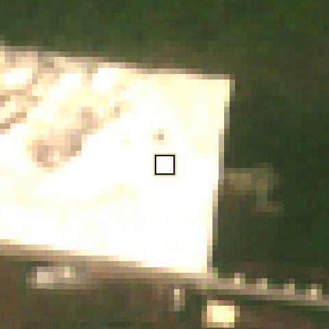 Satellite photo, 20 December 2024: a large block around the plot has been cleared and sand-filled (bright white)